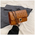 Brown quilted crossbody bag with vintage chain strap and floral metal clasp detail - Brown