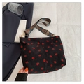 Black corduroy bucket bag with strawberry embroidery and a bohemian wide strap - Black