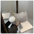 Detail of grey felt crescent bag with V-quilting, gold chain, and white fur pompom charm - Gray (With Charm)