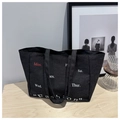 Black denim tote bag with weekly schedule print and fashion quote for daily commuting - Black