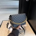 Fashionable black crossbody bag with M-pattern monogram and chunky gold chain strap - Black