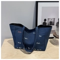 Dark blue denim tote bag featuring weekly abbreviations print and spacious casual design - Blue