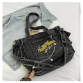 Detail of black denim tote with yellow embroidery and pearl chain accessory decoration - Black