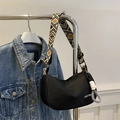 Black half-moon nylon crossbody bag with geometric pattern wide strap and OOTMA logo - Black