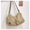 Versatile khaki nylon shoulder bag for travel, featuring a waterproof crossbody design - Khaki