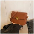 Vintage caramel brown leather crossbody bag with elegant gold-tone square twist lock buckle - Brown