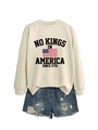 Detail of No Kings in America cream sweatshirt and distressed denim shorts set - Sand (Black Graphics)