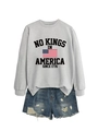 Detail of grey crewneck sweatshirt with 'No Kings In America' print and denim shorts - Gray (Black Graphics)