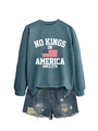 Close-up of No Kings In America crewneck sweatshirt with vintage American flag print - Blue (White Graphic)