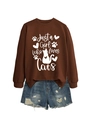 Flat lay of brown long sleeve cat print sweatshirt and blue distressed denim shorts set - Coffee (White Font)
