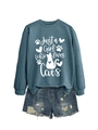 Detail of blue crewneck sweatshirt with Just a Girl Who Loves Cats text and feline graphics - Blue (White Font)