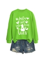 Detail of green sweatshirt with Just a Girl Who Loves Cats text and feline graphics - Neon Green (White Font)