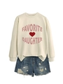 Detail of white sweatshirt with pink favorite daughter text and blue distressed denim shorts - Sand