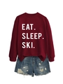 Detail of burgundy Eat Sleep Ski printed sweatshirt paired with distressed denim shorts - Wine Red (White Font)