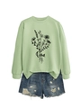 Détail à plat du sweat-shirt Oma vert menthe avec motif floral et short en jean - Vert olive (Motif noir)