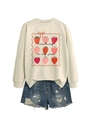 Detail of cream sweatshirt with Teaching is my jam strawberry print and denim shorts - Sand (Black Letters)
