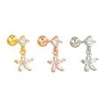 Trois boucles d'oreilles fleur en acier inoxydable en finitions or, argent et or rose - Or