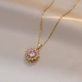 Elegante roterende bloemhanger ketting met roze zirkoon in goudkleurig titanium staal - Roze Bloemenketting (X1698)