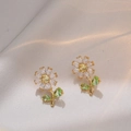 Exquisite daisy flower stud earrings with white zircons and green leaf crystal accents - Gold