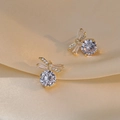 Elegant gold dragonfly stud earrings featuring sparkling zircon wings and large round gems - Gold