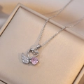 Silver-toned swan pendant necklace with pink crystal and zircon on a jewelry box - Swan Necklace (X2459)