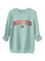 Close-up of mint green crewneck sweatshirt showing BESTIES lettering and heart detail - Light Green