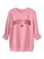 Detail of rolled sleeve and vintage BESTIES lettering on thick pink cotton sweatshirt - Peach