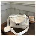 Detail of white pleated texture shoulder bag with butterfly buckle and mini pouch - Off White