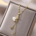 Collana sacchetto della fortuna dorata con gemma a cuore e nappe metalliche - Ciondolo Nappa Cuore Sacco della Fortuna (X0210) / Oro