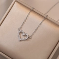 Elegant hollow heart pendant necklace with zircon stones on champagne jewelry box - Silver (X1965 Heart Necklace With Pendant)