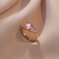 Elegant gold open ring featuring square pink zircon and triangular side stones - Pink Gemstone Ring