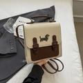 Cream and brown dual-tone backpack featuring a cute dachshund embroidery and buckles - Dachshund Embroidery Style / Off White