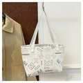 White faux leather tote bag with brown monogram print and long shoulder straps - White