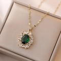 Vintage gold necklace with oval emerald green gemstone and sparkling zircon halo - Emerald Zircon Necklace (X2000)