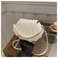 White shell-shaped handbag with vertical quilting and elegant pearl top handle - Off White