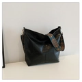 Large capacity black textured shoulder bag featuring a vibrant patterned wide strap - Black