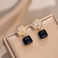 Elegant rose floral earrings with blue gemstone drops and sparkling cubic zirconia - Camellia Dark Blue Gemstone Dangle Style (E392)