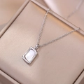 Minimalist square shell pendant necklace on champagne satin jewelry box display - Silver Rectangular Shell Necklace (X2132)