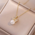 Elegant gold bow necklace with shimmering zircon pavé and white pearl pendant in box - Bow Pearl Pendant Necklace (X2146) / Gold Necklace Set