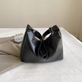 Minimalist black PU leather shoulder bag with smooth texture and silver metal zipper - Black