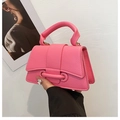Mini hot pink leather handbag with litchi grain and top handle in a stylish crossbody design - Rose Red