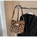 Detail of leopard print faux fur tote with leather shoulder strap and sheep embroidery - Brown