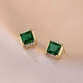 Elegant gold earrings with square emerald green stones and small zircon accents - Emerald Green Sugar Earrings