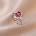 Bague fleur en argent avec rubis ovale et halo de zircon sur soie couleur champagne - Bague réglable en pierre précieuse rouge (J148)