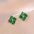 Elegant emerald green zircon geometric stud earrings on soft beige silk background - Emerald Green Earrings (E494)