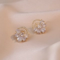 Elegant floral stud earrings with sparkling cubic zirconia on champagne silk background - Gold Zirconia Flower Earrings (E503)