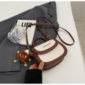 Retro saddle crossbody bag in brown and off-white with plush monster charm detail - Off-White (With Pendant)