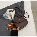 Dark brown leather handbag with gold bar and plush monster charm in caramel - Coffee (With Pendant)