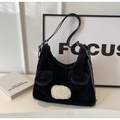 Detail of plush black faux fur bag with cute cat ear design and silver chain strap - Black