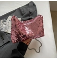 Close-up of pink sequined crossbody bag with silver chain and metallic zip detail - Pink